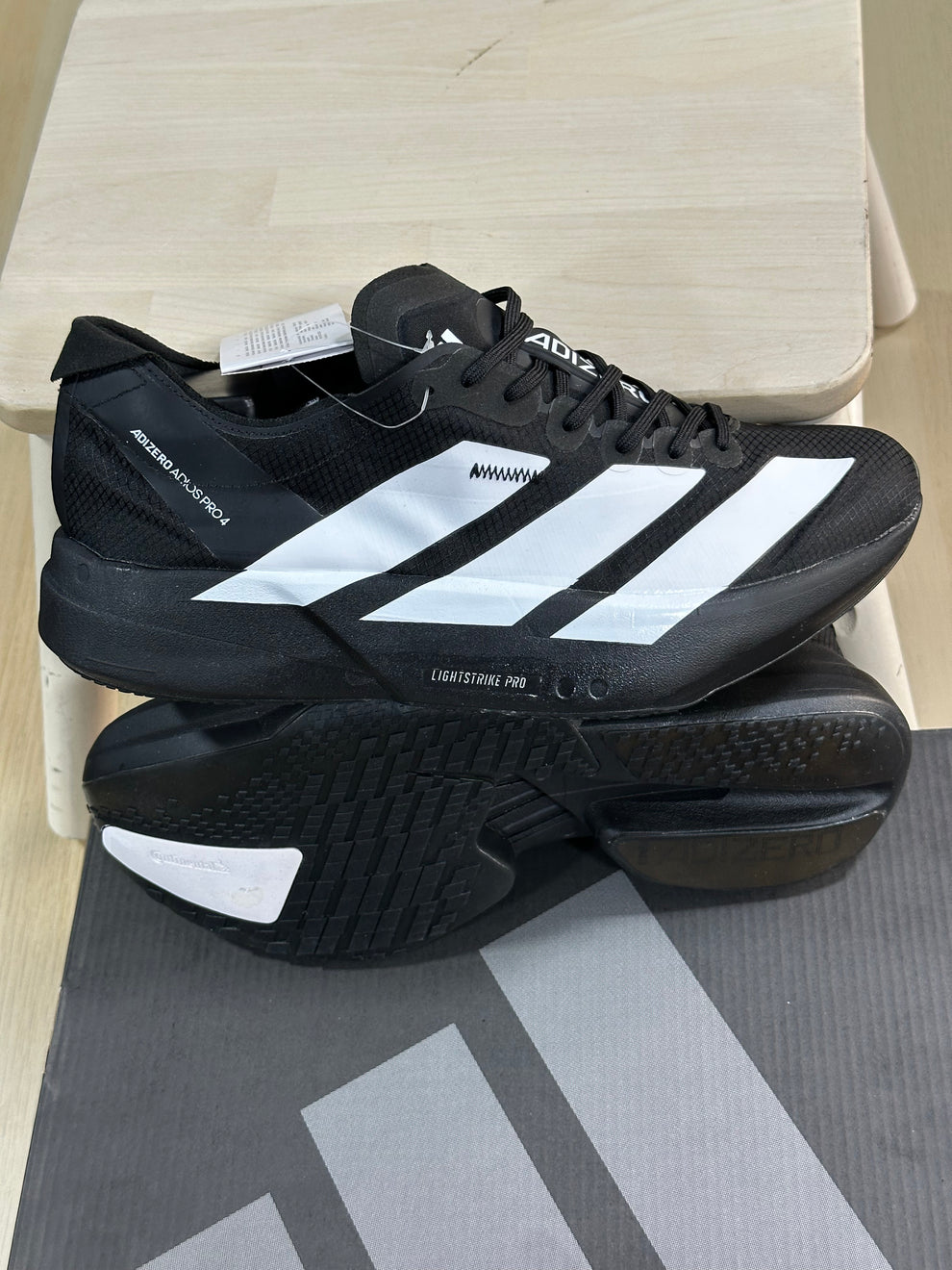 ADS® Adizero Adios Pro 4 "Core Black / Cloud White"