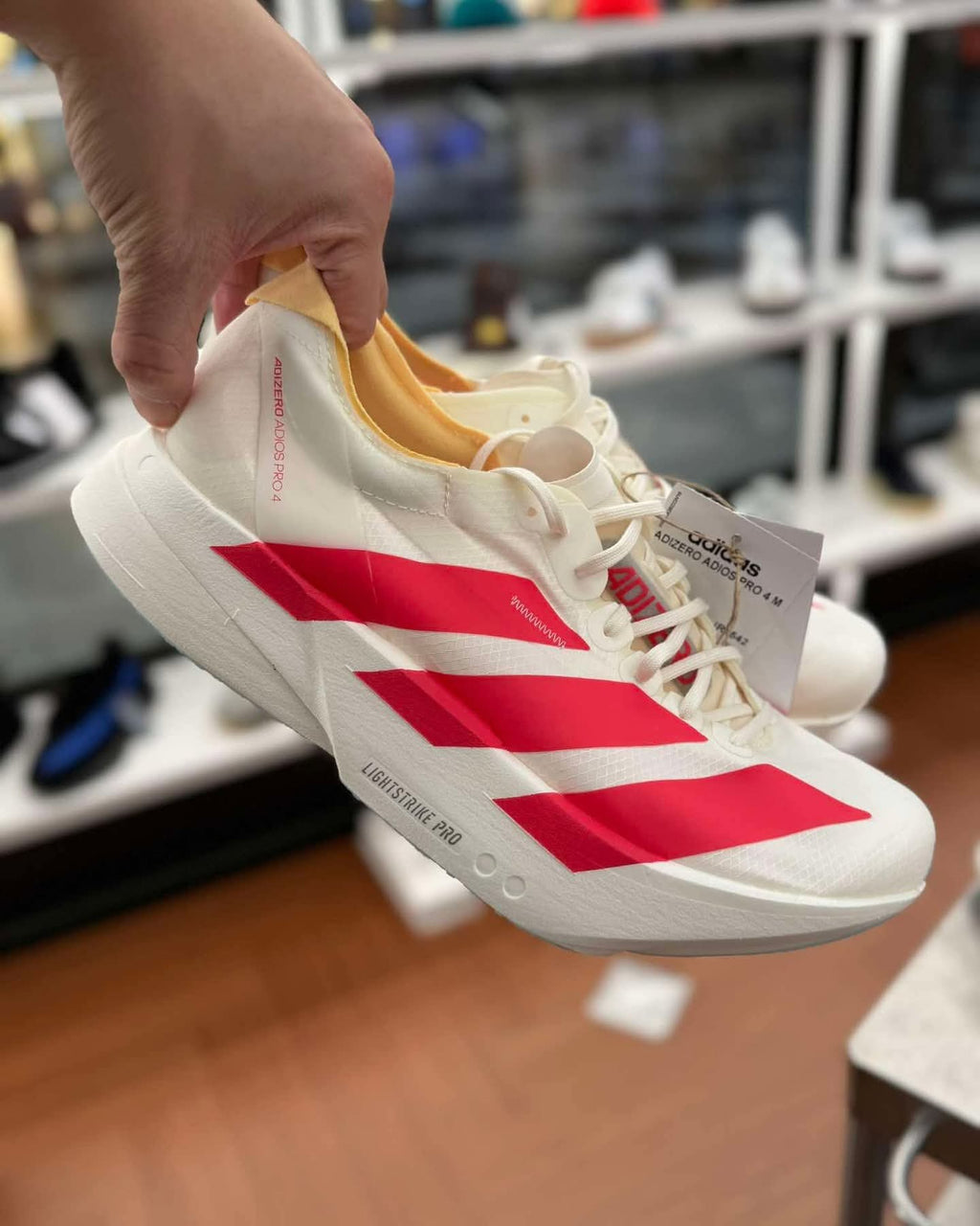 ADS® Adizero Adios Pro 4 "Cloud White / Solar Red"