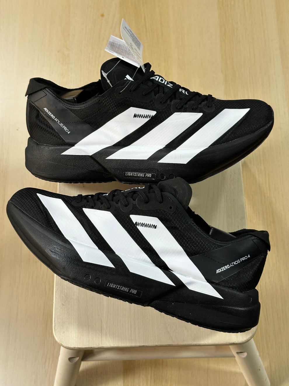 ADS® Adizero Adios Pro 4 "Core Black / Cloud White"