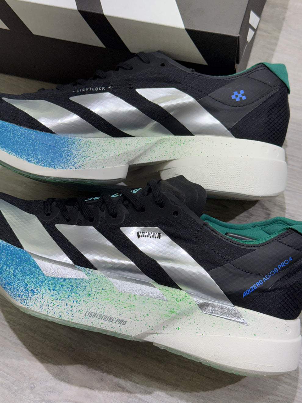 ADS® Adizero Adios Pro 4 "Core Black / Silver Metallic"